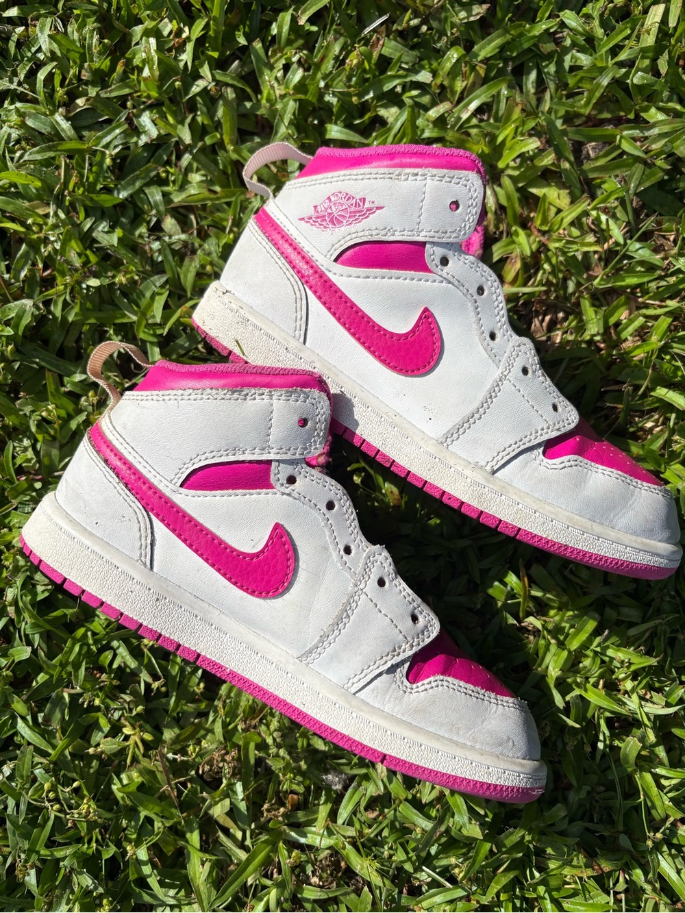 Nike Air Jordan Kids High-Top Sneakers in White and Hot Pink